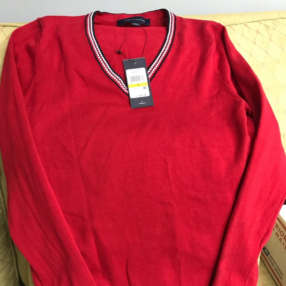 This is all cotton Ivy sweater by Tommy Hilfiger.